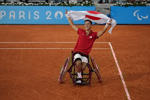 Japan's Tokito Oda celebrates after winning the men's singles gold medal match of wheelchair tennis at the 2024 Paralympics, Saturday, Sept. 7, 2024, in Paris, France.